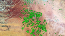 Fields irrigated by water from aquifers 1 km under the desert (Credits: NASA/Landsat/ Robert Simmon and Jesse Allen)