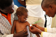 Malnutrition check (Photo: Russell Watkins/DFID)